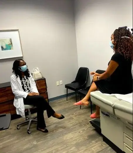 Dr. Adelola Ashaye of InTouch Primary Care with her patient during an appointment